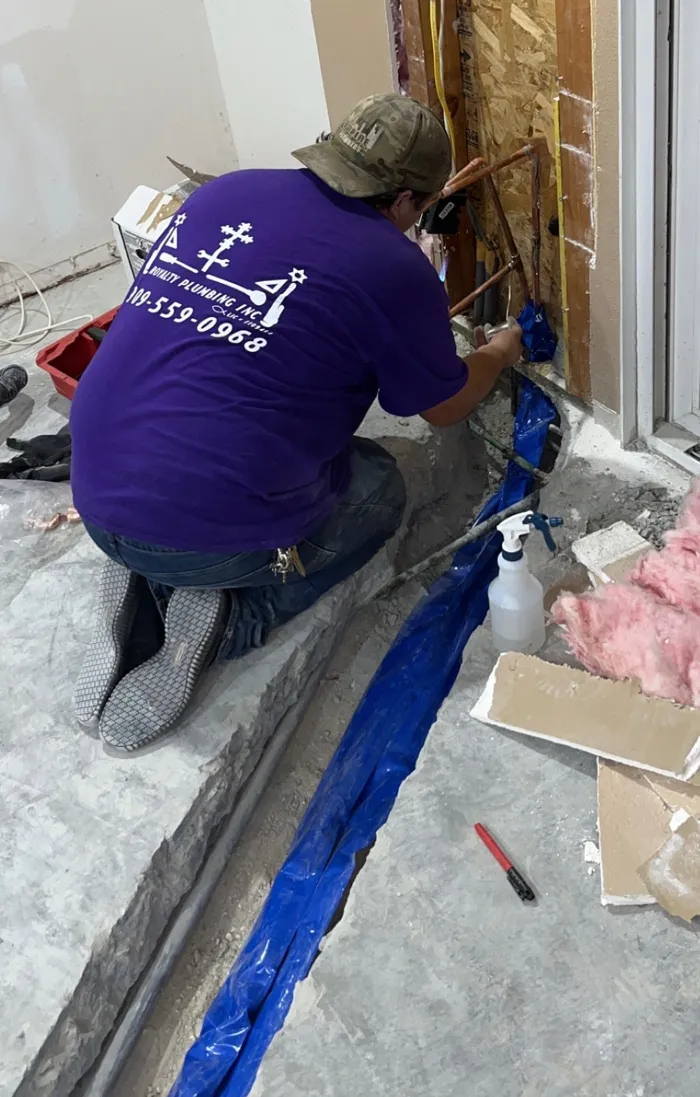 Royalty Plumbing technician working on a job
